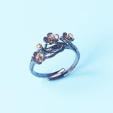 The cherry blossom branch resizable open ring in white copper silver plated