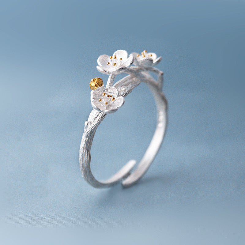 The cherry blossom branch resizable open ring in white copper silver plated