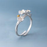 The cherry blossom branch resizable open ring in white copper silver plated